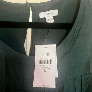 Green sleeveless tiered dress